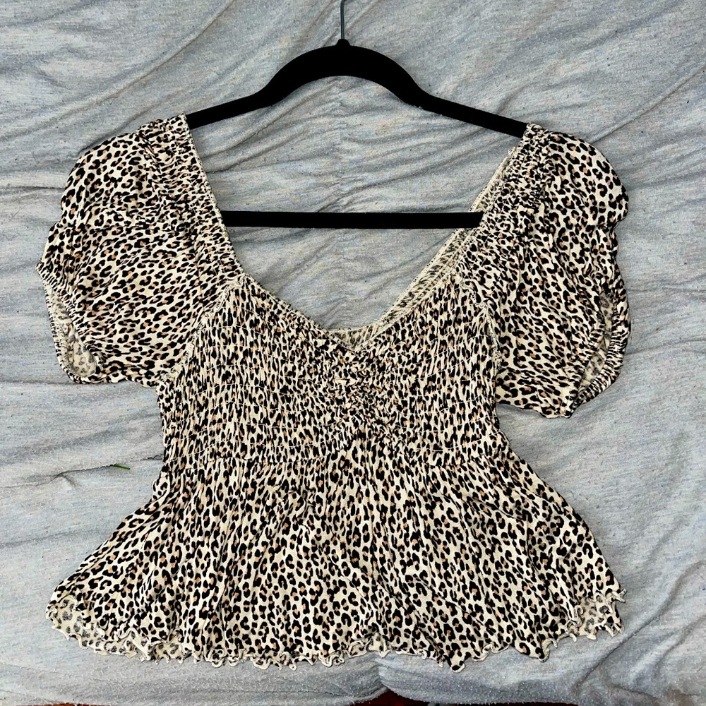 Cheetah v-cut top